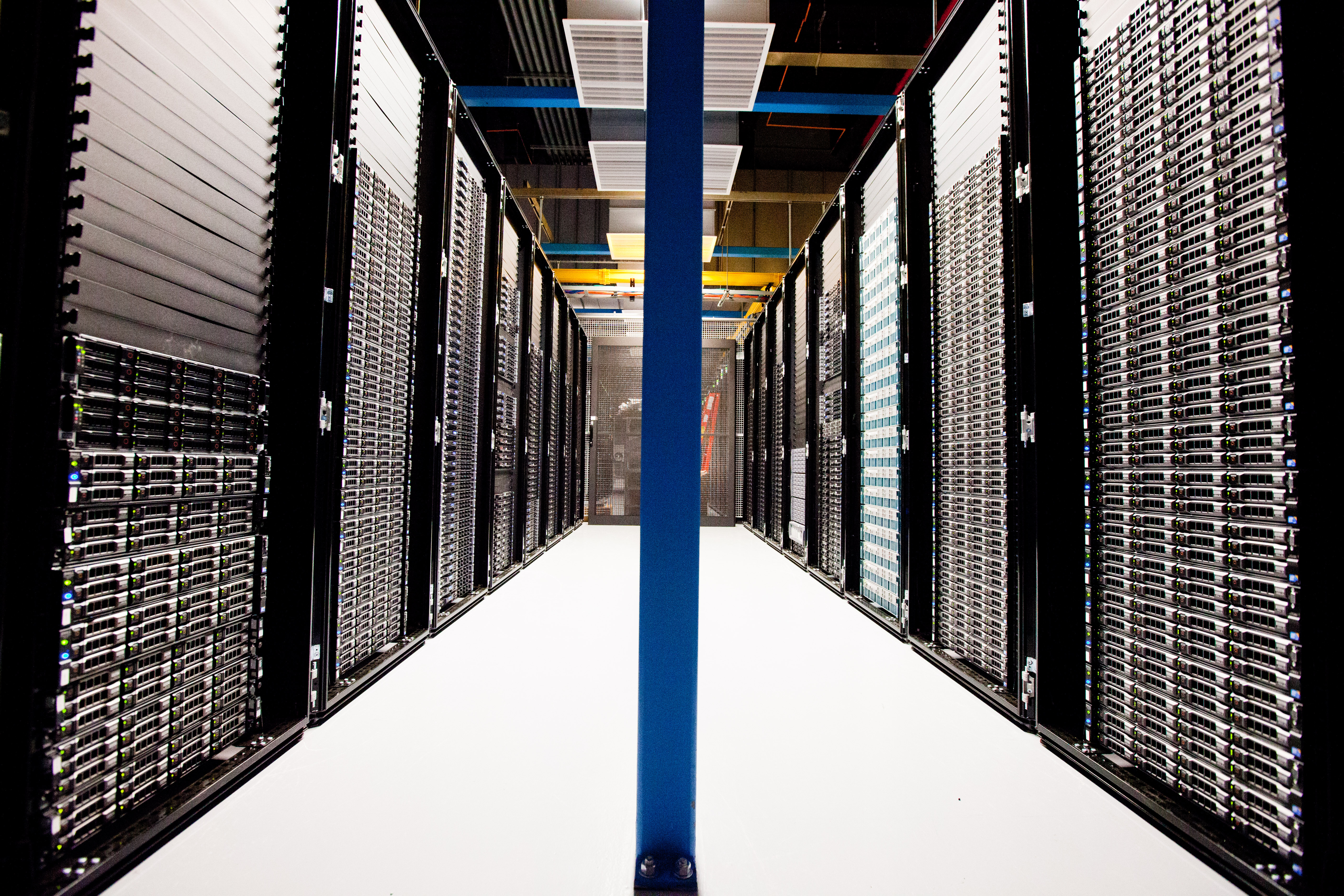Rows of Wikimedia server racks in an archival July 2012 photograph.
